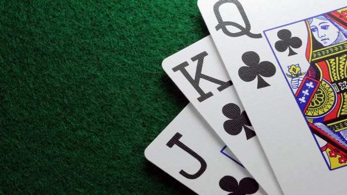 Jack, Queen, and King of Clubs Poker Cards