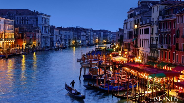 Venice Canal at Dusk with Gondolas and Restaurants