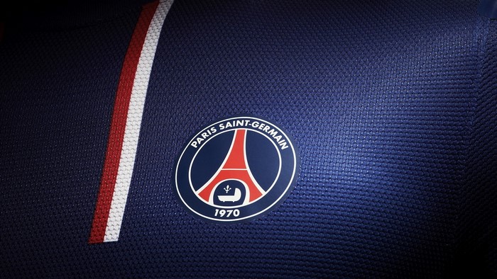 Paris Saint-Germain logo on a blue shirt
