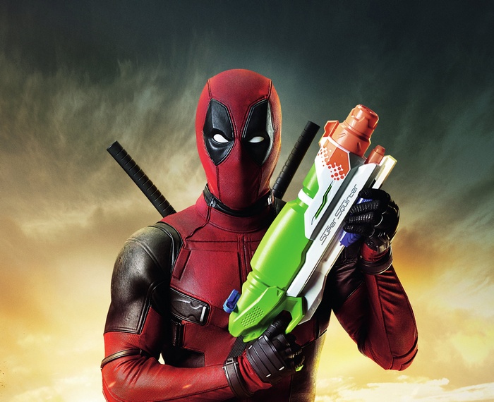 Deadpool holding a Super Soaker water gun