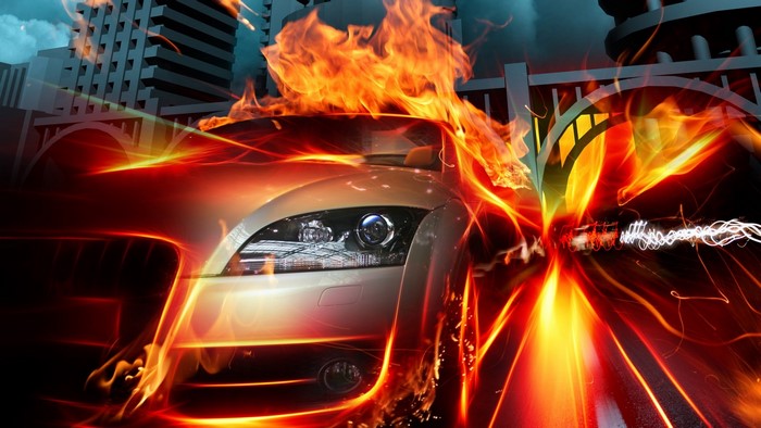 Car on Fire in City