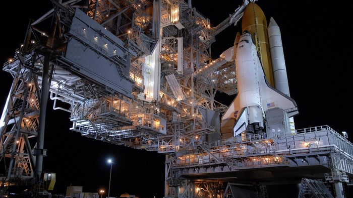 Space Shuttle on Launch Pad at Night