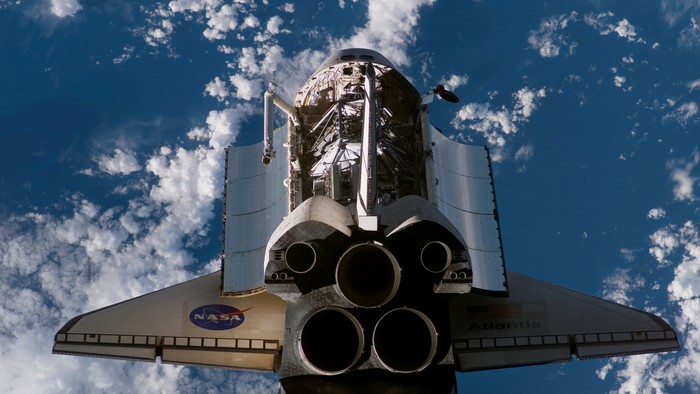 Space Shuttle Atlantis in orbit above Earth