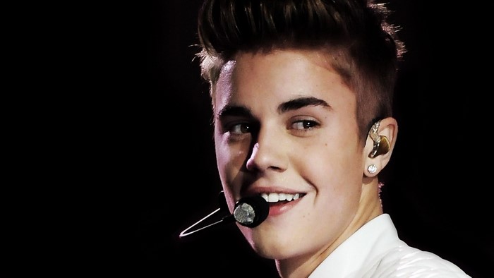 Justin Bieber performing on stage