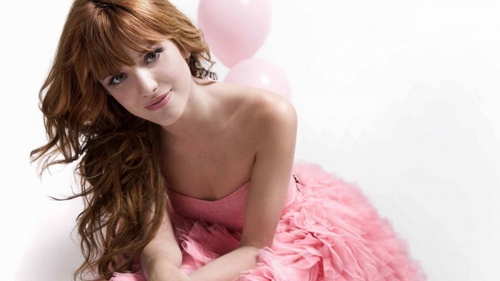 Bella Thorne in a pink dress with balloons