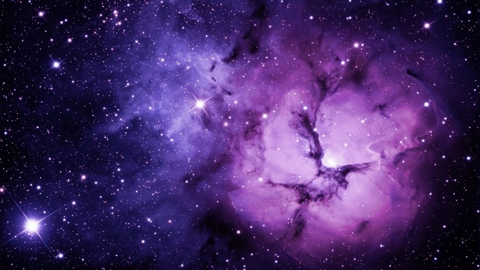 Purple Nebula and Stars in Space