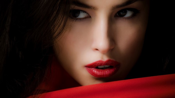Woman with red lipstick and red scarf