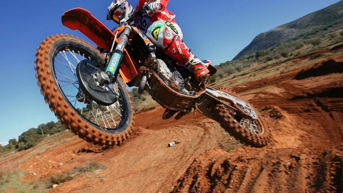 Motocross rider jumping a dirt bike