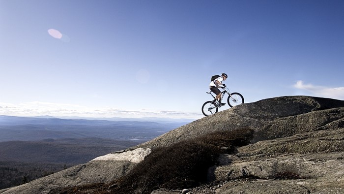 Man riding a mountain bike on a rocky hill