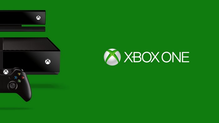 Xbox One console and controller on green background