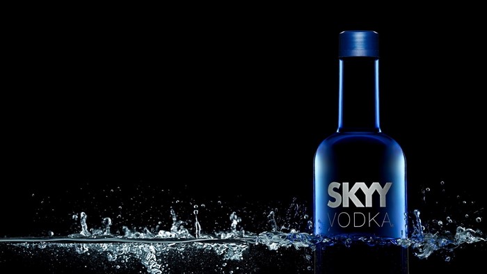 SKYY Vodka bottle in water