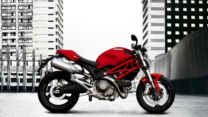 Red Ducati Monster Motorcycle in Urban Setting