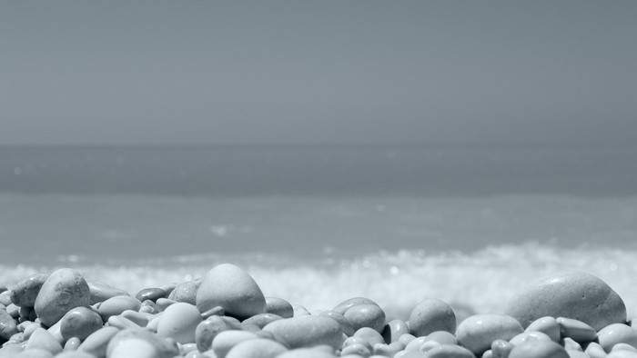Pebble Beach with Ocean Waves