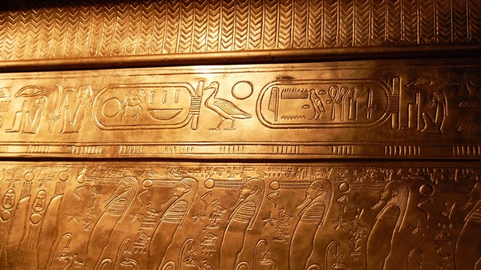 Ancient Egyptian Hieroglyphs on Golden Sarcophagus