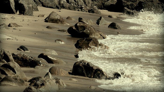 Rocky beach with waves crashing