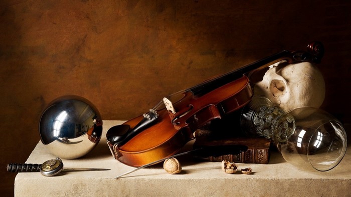 Still life with violin, skull, and reflective sphere