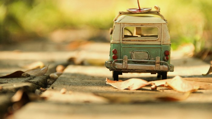 Vintage classic car toy on a path