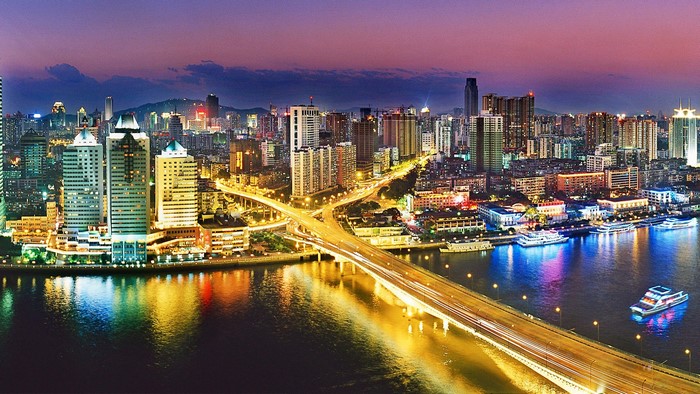 Guangzhou Cityscape at Night with River and Bridge