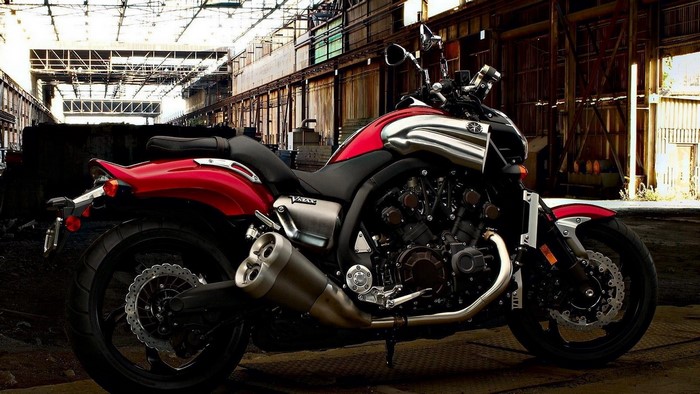 Red Yamaha VMAX motorcycle in industrial building