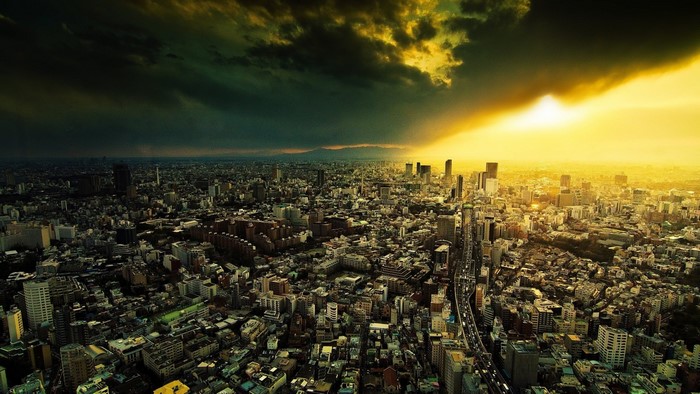 Aerial view of Tokyo, Japan at sunset with stormy clouds