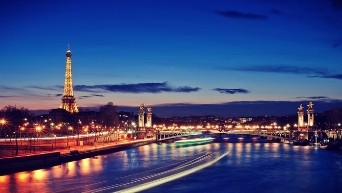 Eiffel Tower and Seine River at Night in Paris
