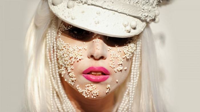 Lady Gaga with pearls and white hat