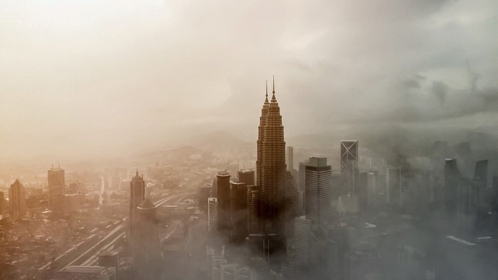 Petronas Towers in Kuala Lumpur shrouded in fog