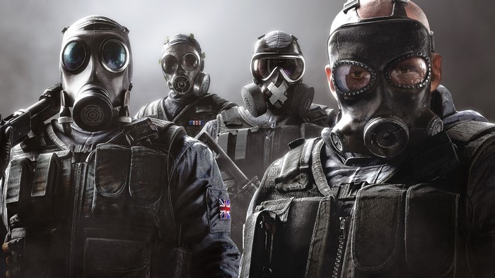 Four soldiers in gas masks from Tom Clancy's Rainbow Six Siege