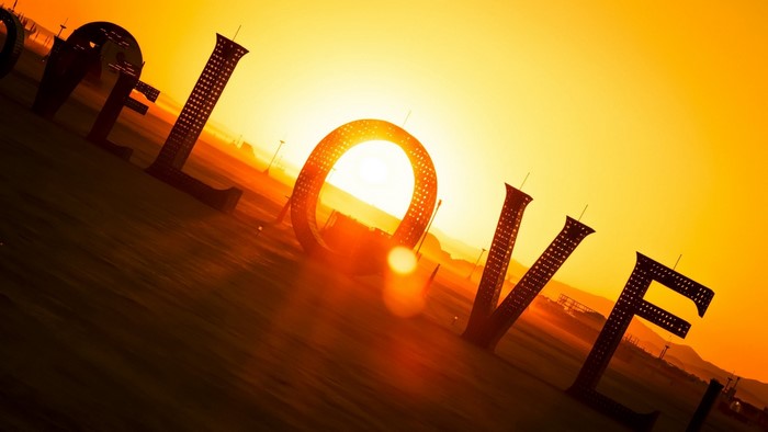 Giant LOVE sculpture at sunset
