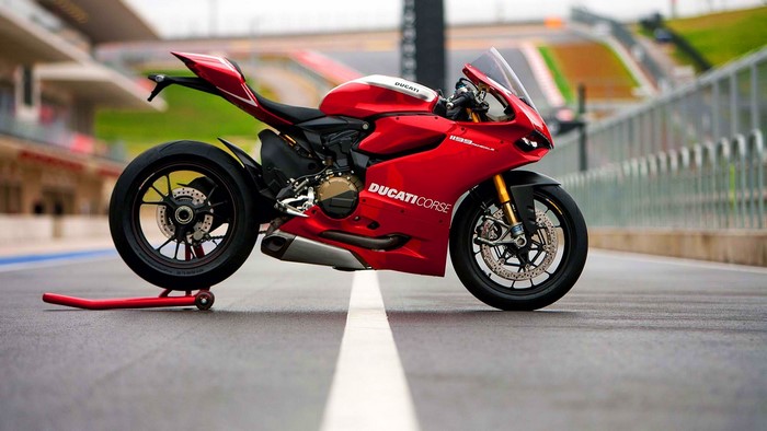 Red Ducati Corse Sportbike Motorcycle on Track