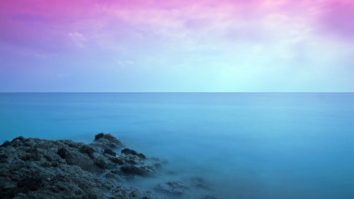 Colorful Seascape with Rocks and Ocean