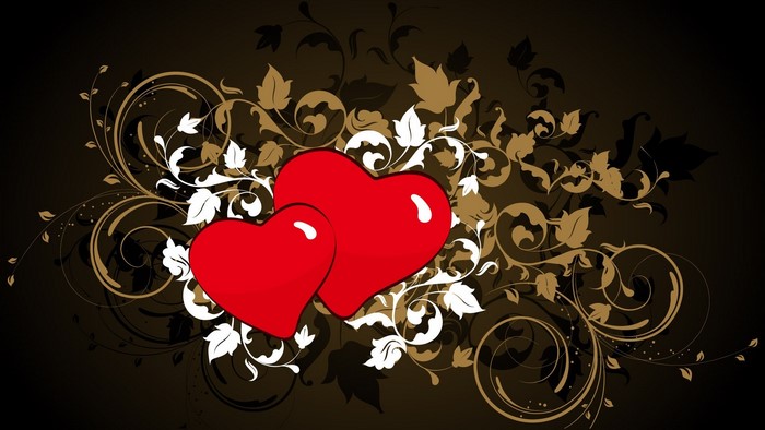 Two red hearts with floral design