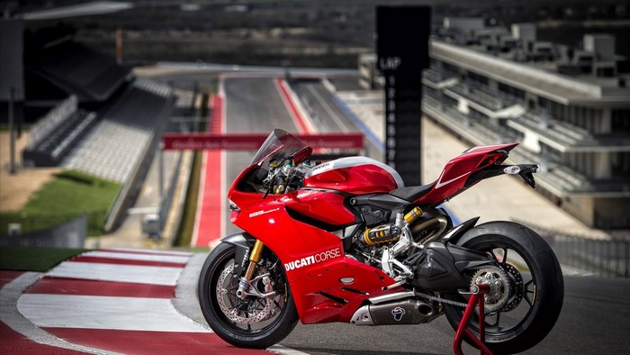 Red Ducati Corse Sport Bike on Race Track