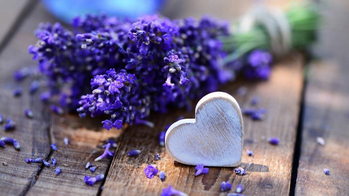 Lavender and a wooden heart on a table