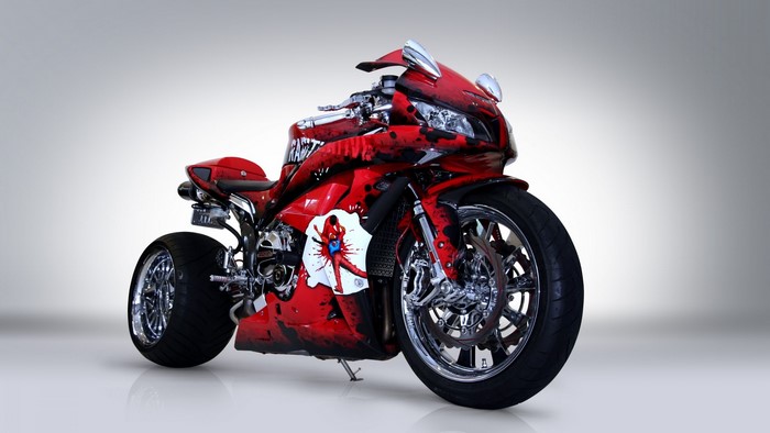 Red Honda CBR600RR motorcycle with custom graphics