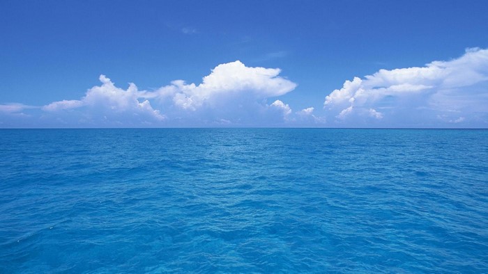 Blue Sea and Sky with Clouds
