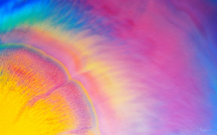 Colorful abstract fluid art with glitter
