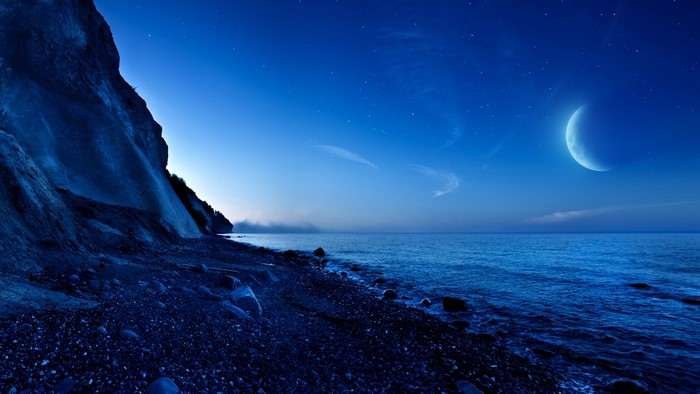 Moonlit Cliffside Beach with Crescent Moon