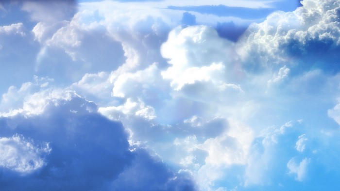 Blue sky with white and gray clouds