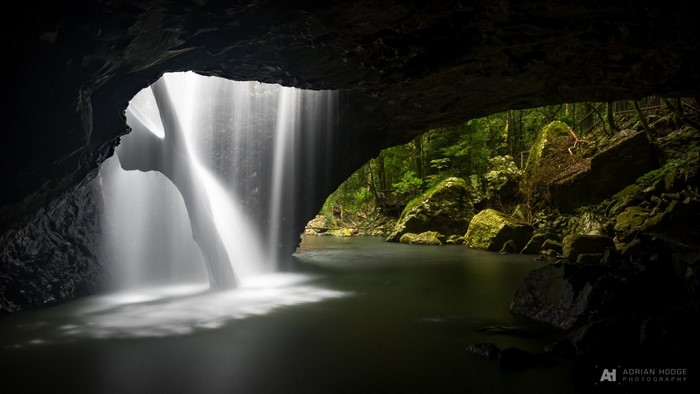 Waterfall inside a cave at Springbrook National Park, Australia