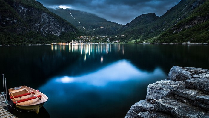 Geiranger Lake Norway with a boat