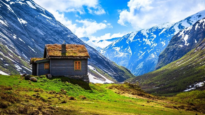 Cabin in a Mountain Landscape