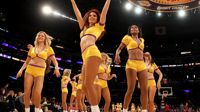 Laker Girls Cheerleaders performing on court