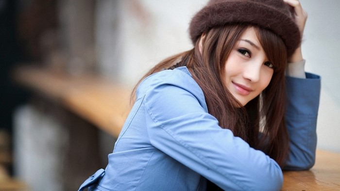 Cute Asian Girl Wearing a Hat