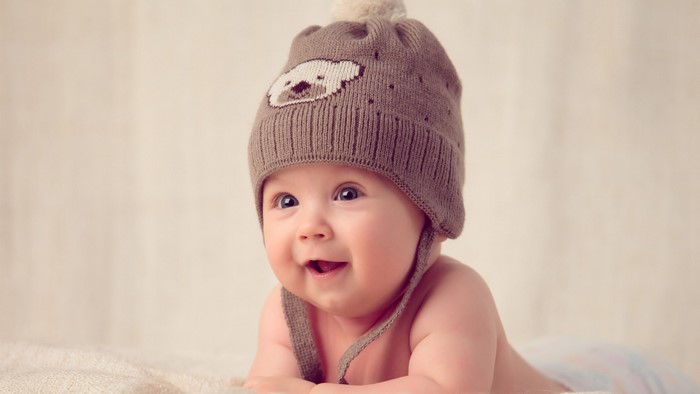 Baby wearing a cute bear hat