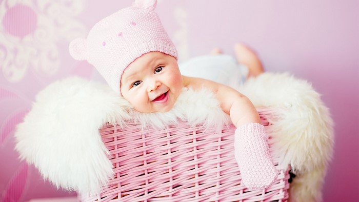 Cute Laughing Baby in Pink Hat