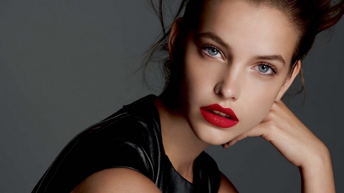 Woman with red lips and black top
