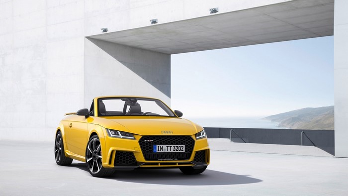 Yellow Audi TT RS Roadster parked outdoors