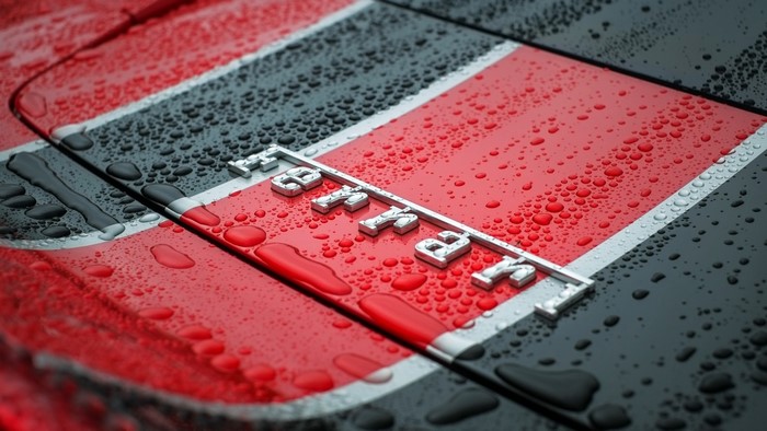 Ferrari Logo on a Wet Car Hood