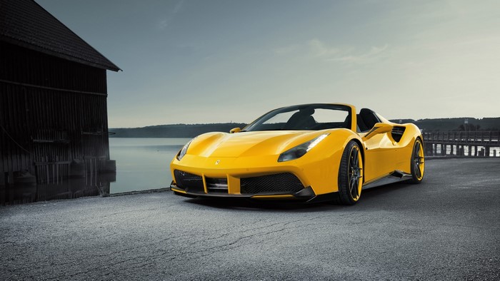 Yellow 2017 Ferrari 488 Spider by a Lake